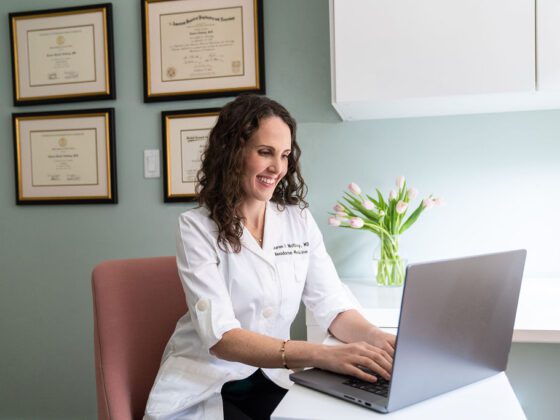 Dr. Natbony writing a blog post
